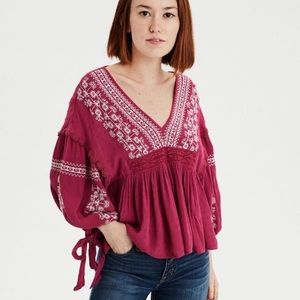 Pink long sleeve embroidered peasant top